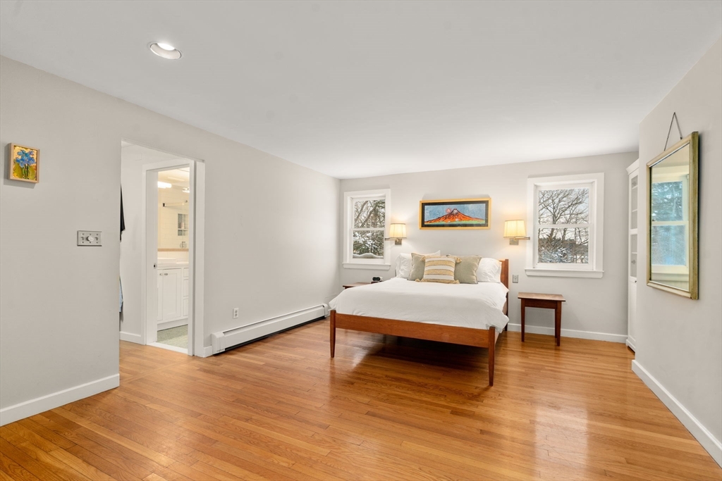 26 Jeffrey Road Wayland, MA 01778 - Photo 15 of 40 a living room with furniture and a wooden floor