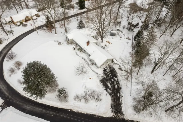 a view of a snow in the yard