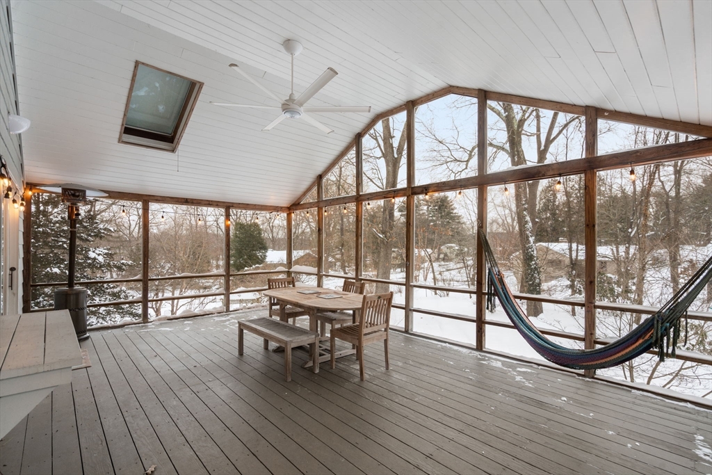 26 Jeffrey Road Wayland, MA 01778 - Photo 32 of 40 an empty room with wooden floor and large windows