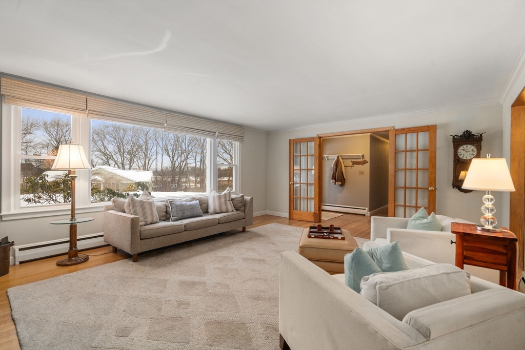 26 Jeffrey Road Wayland, MA 01778 - Photo 4 of 40 a living room with furniture and a large window