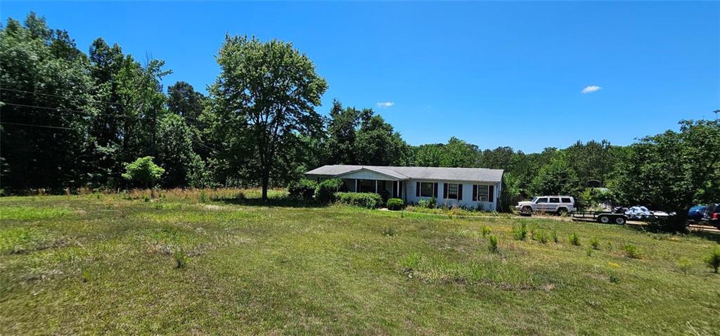 944 Lite-N-Tie Road Macon, GA 31211 - Photo 23 of 36 a view of a house with a backyard