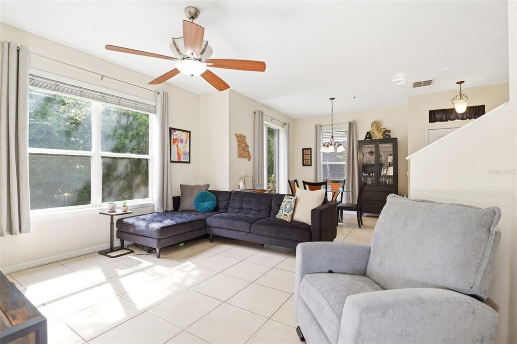 6458 South Goldenrod Road, Unit 29B Orlando, FL 32822 - Photo 8 of 40 a living room with furniture and a large window