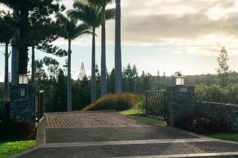 a outdoor living space with furniture and a fireplace