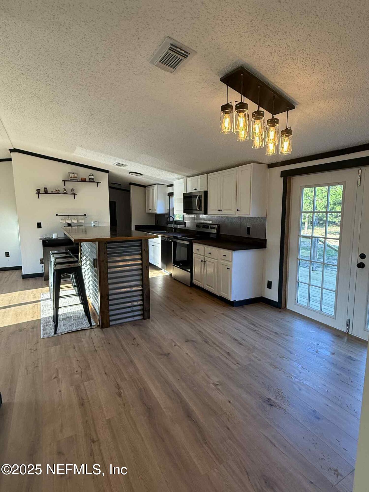 728 Cousintown Road Interlachen, FL 32148 - Photo 10 of 44 713428b6-cb57-4d6f-a6ea-a0c315e596d9