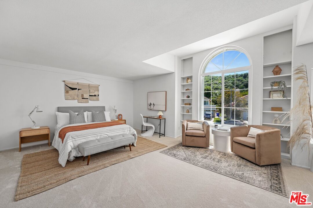 24006 Briardale Way Newhall, CA 91321 - Photo 20 of 34 a bedroom with furniture and a large window