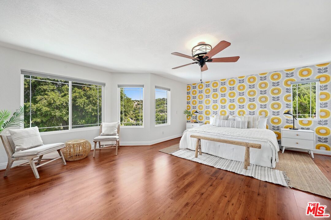 24006 Briardale Way Newhall, CA 91321 - Photo 23 of 34 a living room with furniture and wooden floor