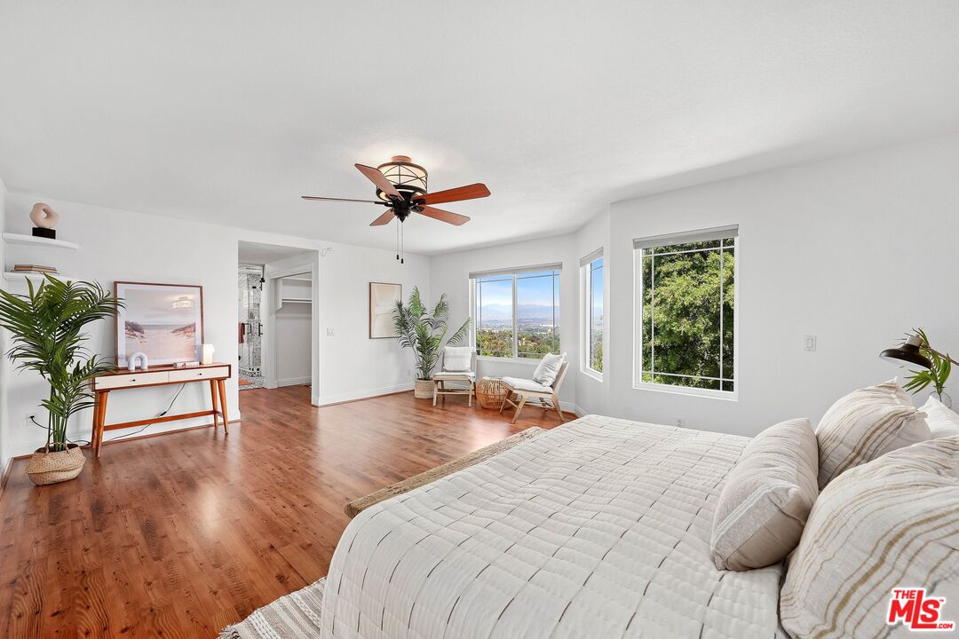 24006 Briardale Way Newhall, CA 91321 - Photo 24 of 34 a bed room with a bed and a chair