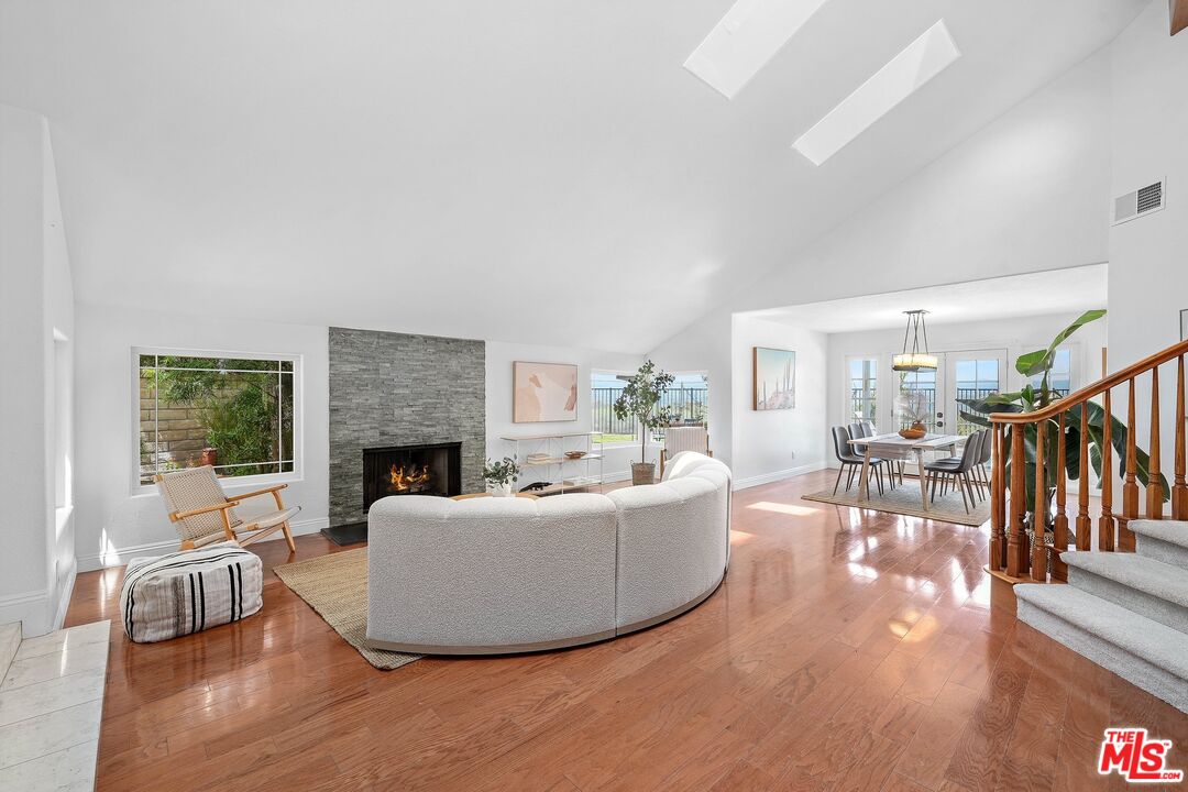 24006 Briardale Way Newhall, CA 91321 - Photo 4 of 34 a living room with furniture and a fireplace