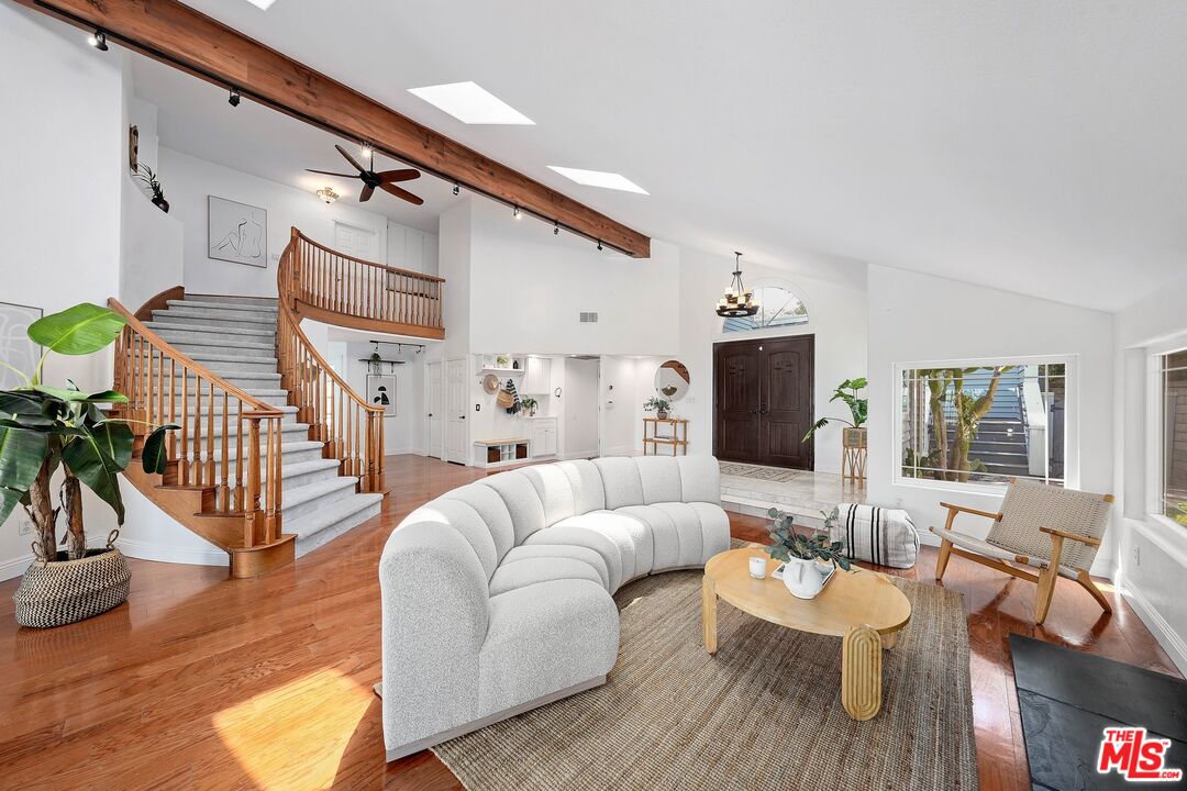 24006 Briardale Way Newhall, CA 91321 - Photo 5 of 34 a living room with furniture and wooden floor