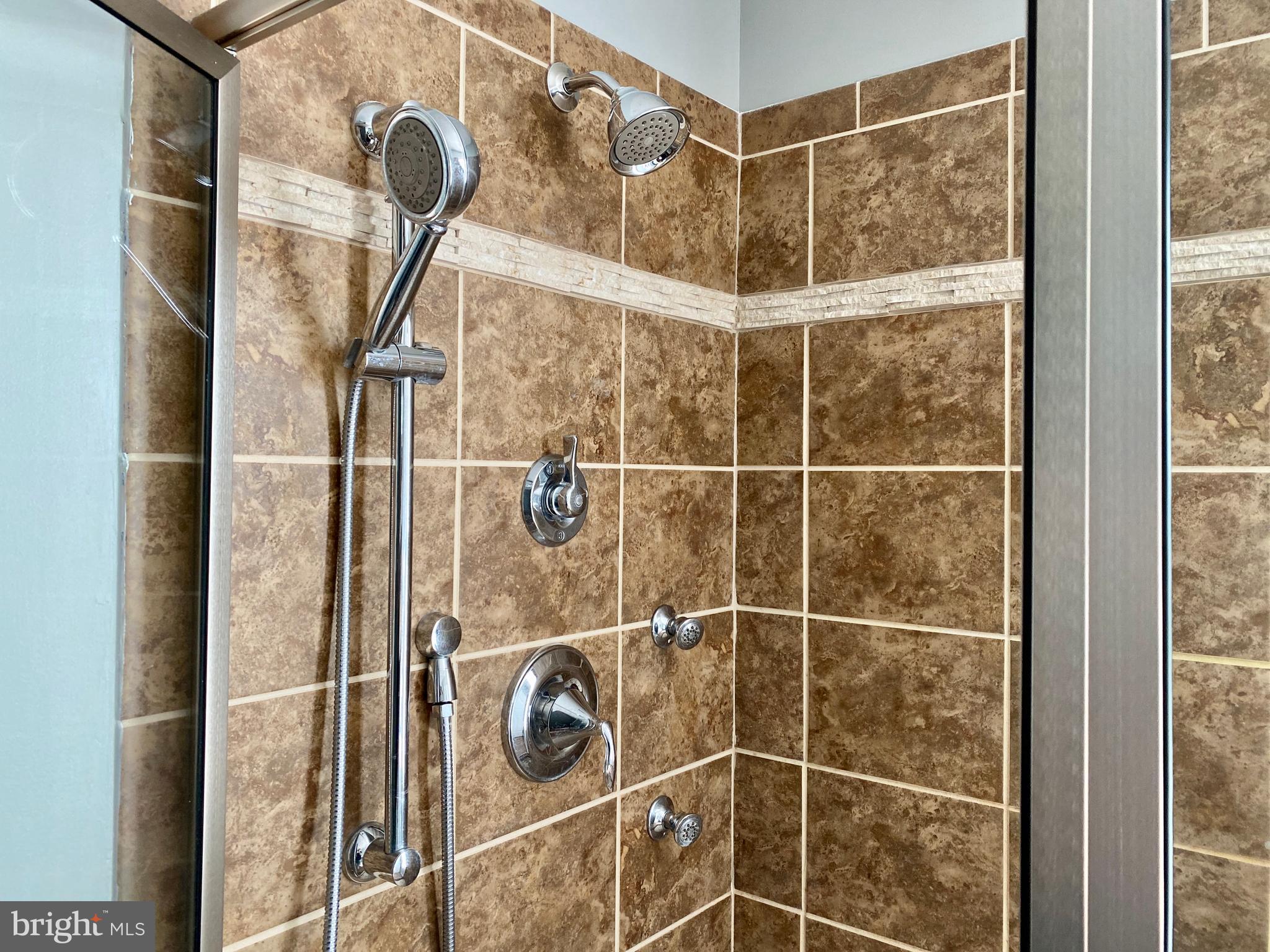 900 South Hayfield Road Winchester, VA 22602 - Photo 11 of 53 Luxurious Tiled Shower in Master Bathroom