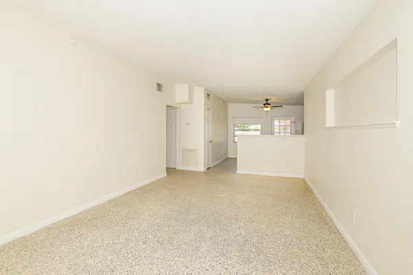 an empty room with windows