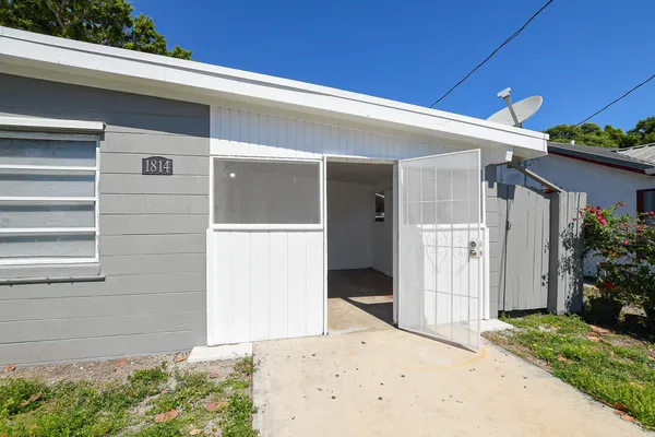 a front view of a house with a garage