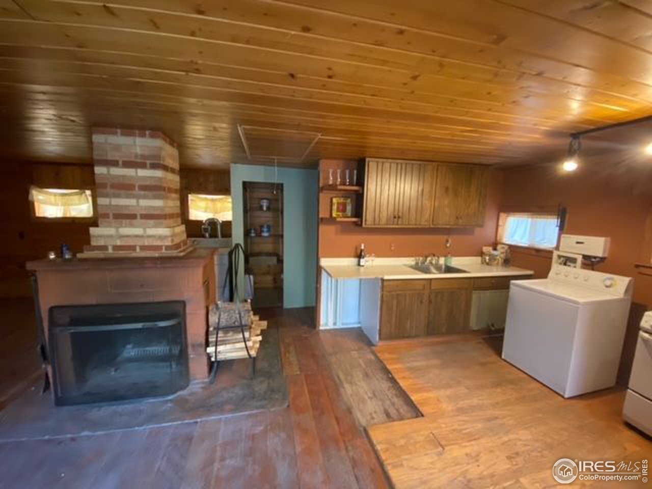 162 Silver Road Black Hawk, CO 80422 - Photo 9 of 28 Kitchen and fireplace area
