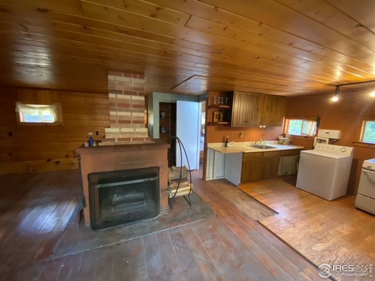 162 Silver Road Black Hawk, CO 80422 - Photo 10 of 28 Kitchen open to fireplace