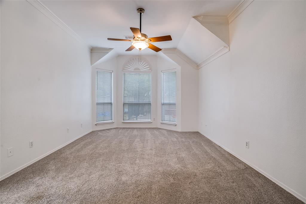 901 Autumn Ridge Drive McKinney, TX 75072 - Photo 13 of 24 an empty room with windows and fan