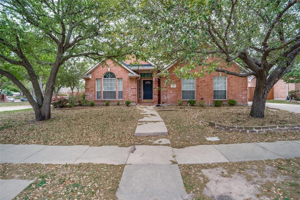 901 Autumn Ridge Drive McKinney, TX 75072 - Photo 2 of 24 front view of a house with a yard