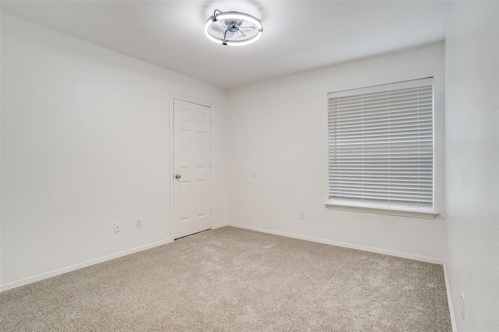 901 Autumn Ridge Drive McKinney, TX 75072 - Photo 20 of 24 an empty room with a window