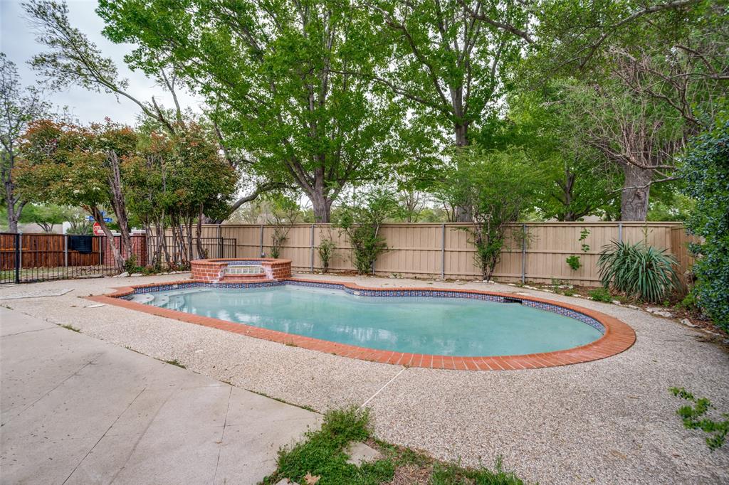 901 Autumn Ridge Drive McKinney, TX 75072 - Photo 22 of 24 a view of outdoor space yard and swimming pool