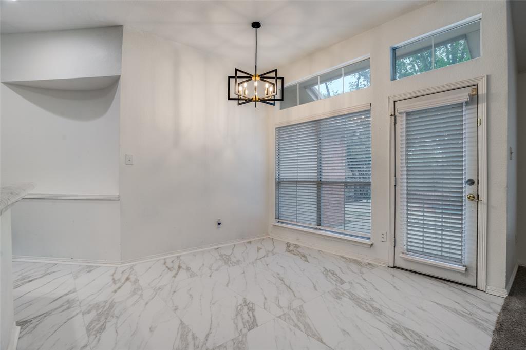 901 Autumn Ridge Drive McKinney, TX 75072 - Photo 9 of 24 a view of an empty room with a window