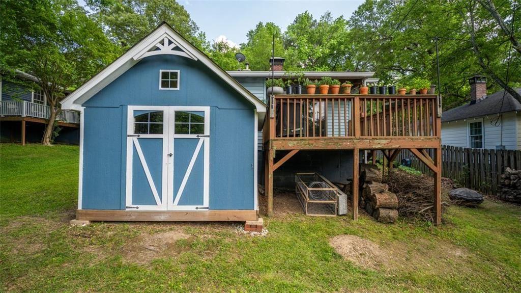 2881 Parrott Avenue Northwest Atlanta, GA 30318 - Photo 29 of 32 a front view of a house with garden