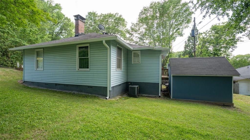 2881 Parrott Avenue Northwest Atlanta, GA 30318 - Photo 30 of 32 a view of a house with a backyard