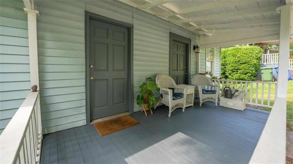 2881 Parrott Avenue Northwest Atlanta, GA 30318 - Photo 3 of 32 a backyard of a house with outdoor seating