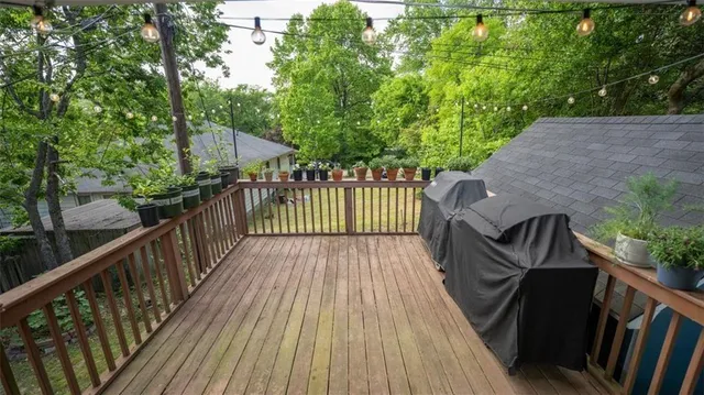 a view of deck and garden