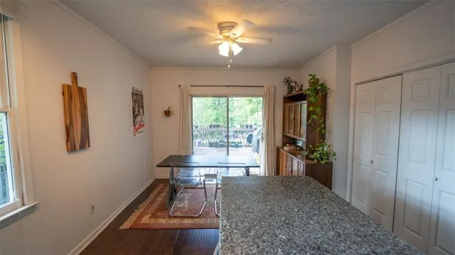 a view of a livingroom with furniture window and outside view