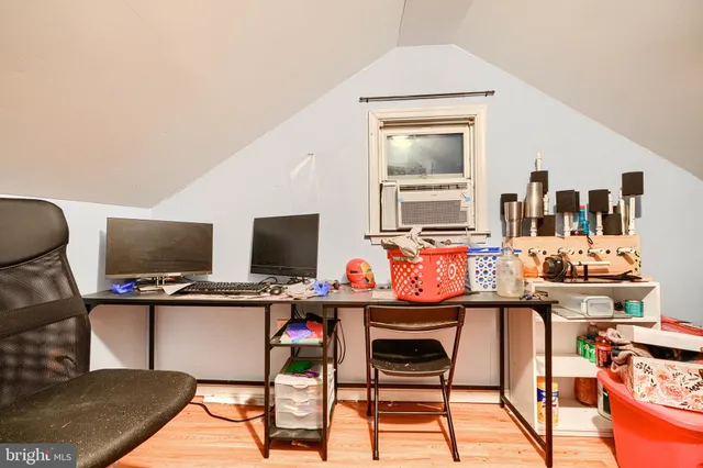 a view of a workspace with furniture