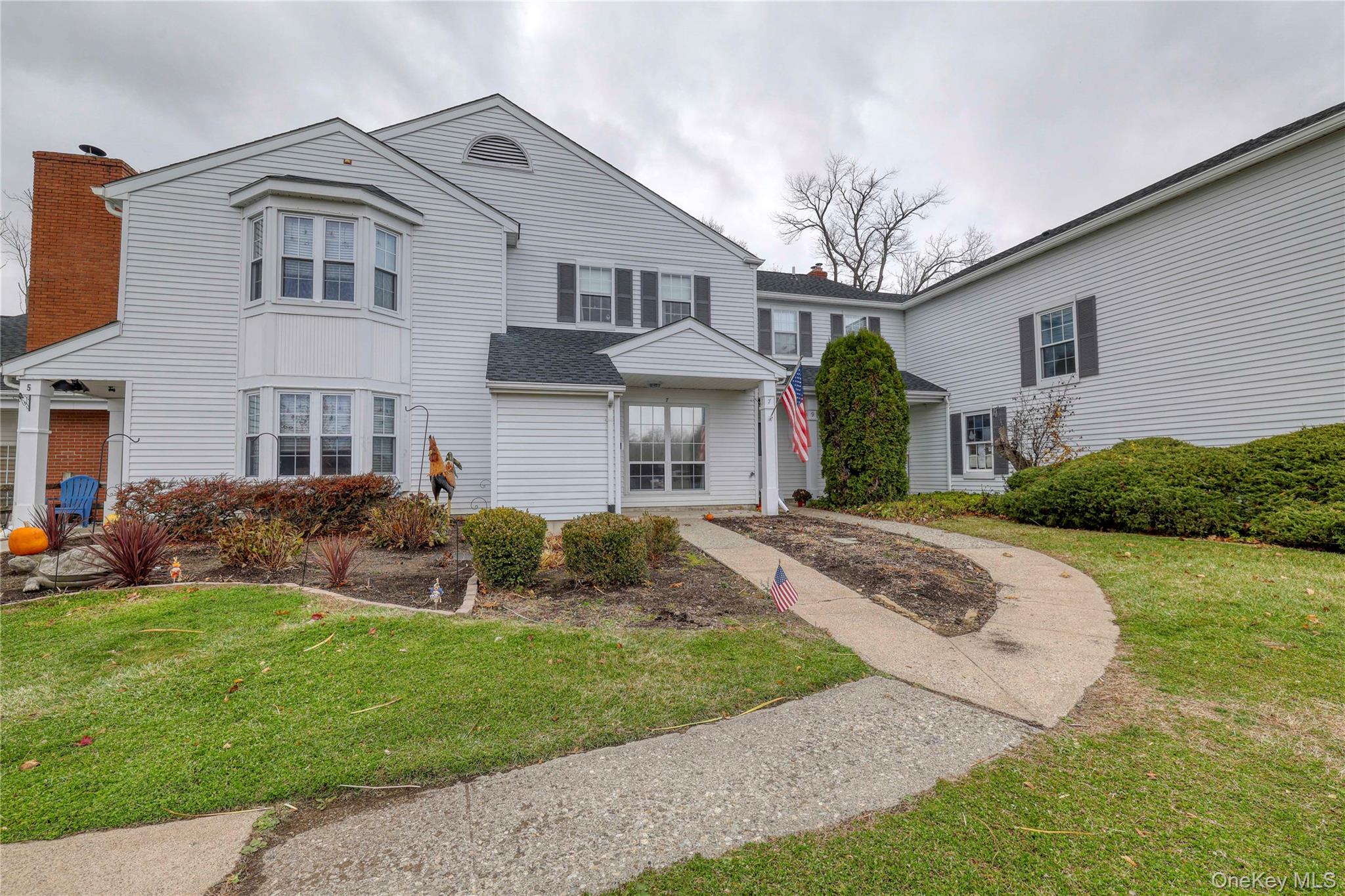 7 Weathervane Way Warwick, NY 10990 - Photo 2 of 21 a front view of a house with a yard