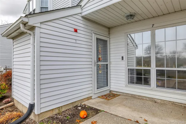 a front view of a house with a garage