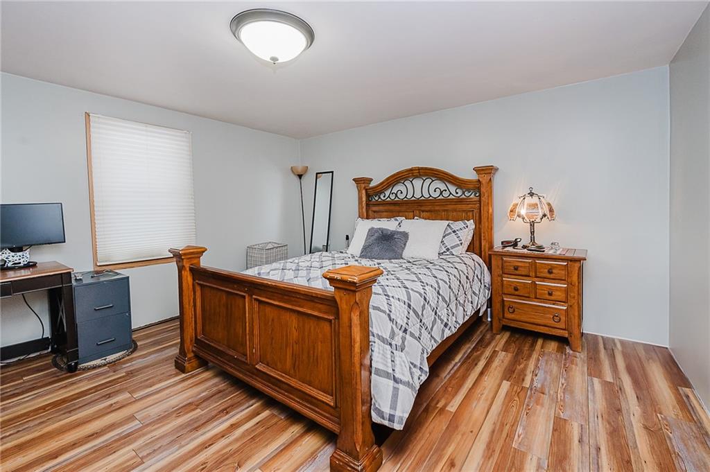 42 Gress Road Creekside, PA 15732 - Photo 17 of 41 a bed sitting in a bedroom next to a window with pc on the wall