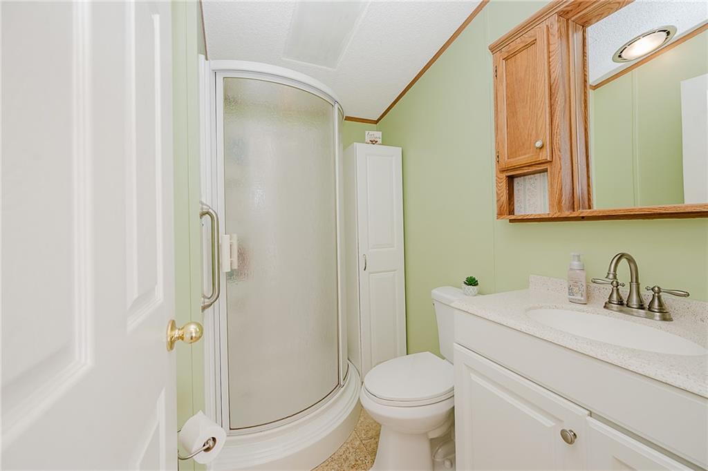 42 Gress Road Creekside, PA 15732 - Photo 19 of 41 a bathroom with a sink toilet and shower