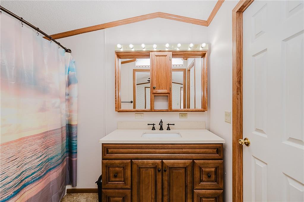 42 Gress Road Creekside, PA 15732 - Photo 23 of 41 a bathroom with a sink and a mirror
