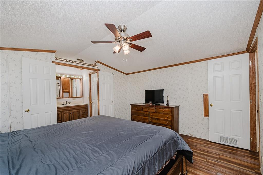 42 Gress Road Creekside, PA 15732 - Photo 26 of 41 a bedroom with a bed and a flat screen tv