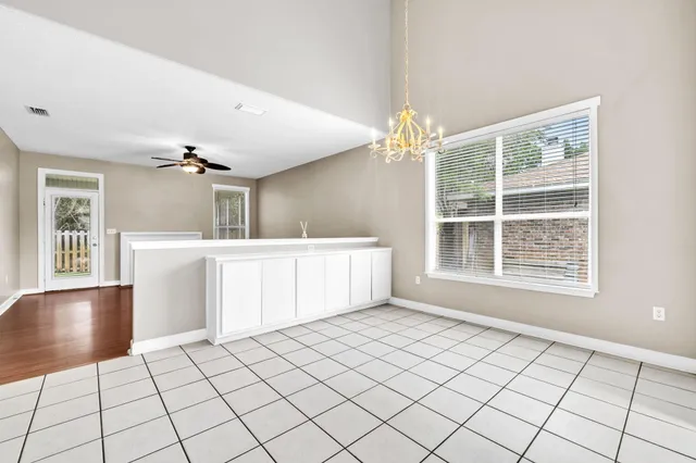 a view of an empty room and window