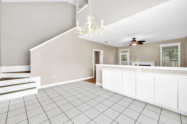 a kitchen with stainless steel appliances a stove sink and microwave