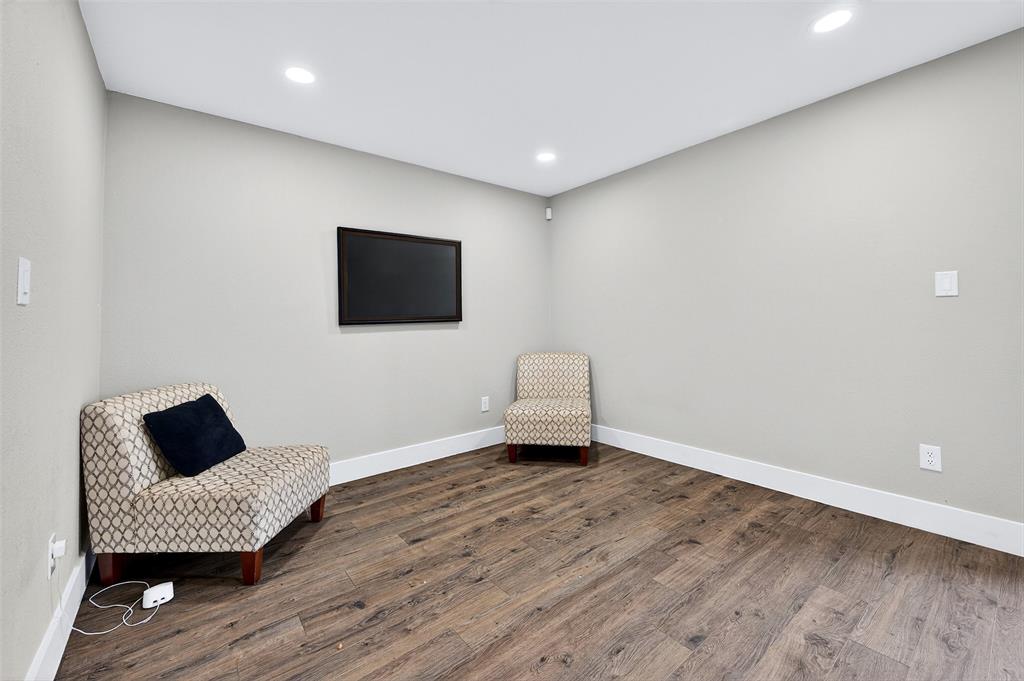 604 East Summit Street Sherman, TX 75090 - Photo 11 of 30 a living room with furniture and a flat screen tv