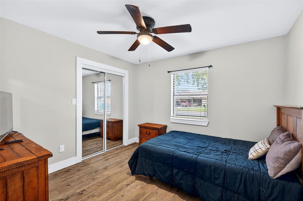 604 East Summit Street Sherman, TX 75090 - Photo 17 of 30 a bedroom with a bed and a dresser