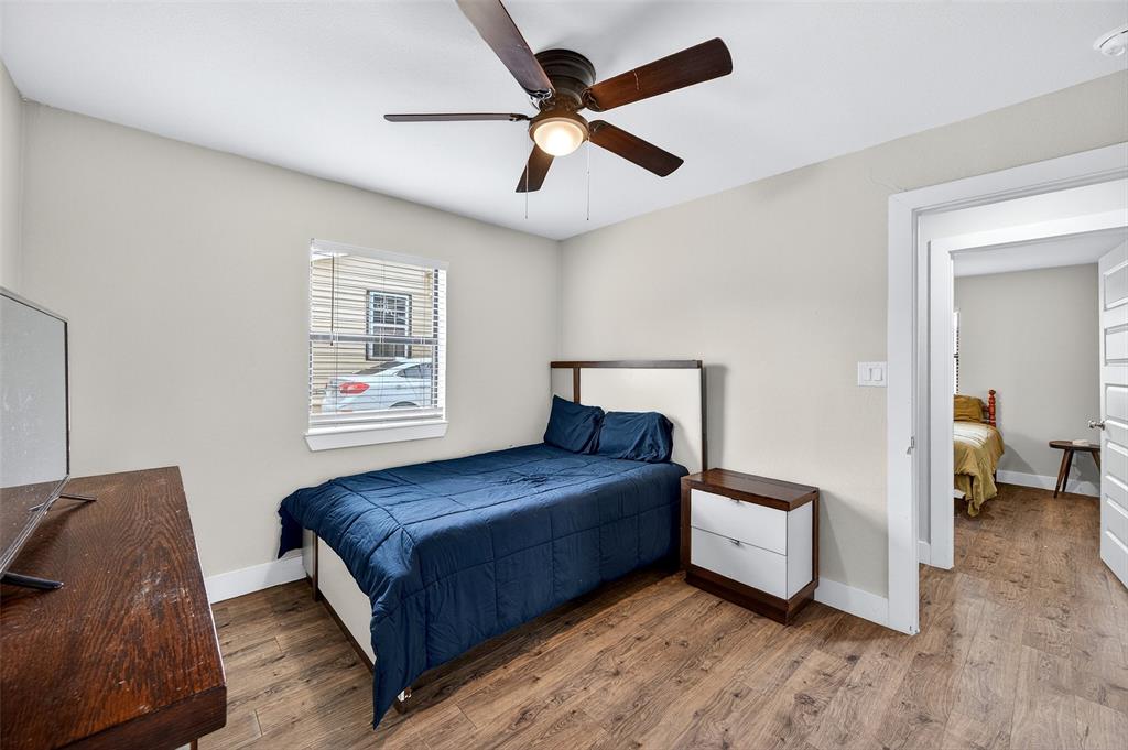 604 East Summit Street Sherman, TX 75090 - Photo 20 of 30 a bedroom with a bed and window