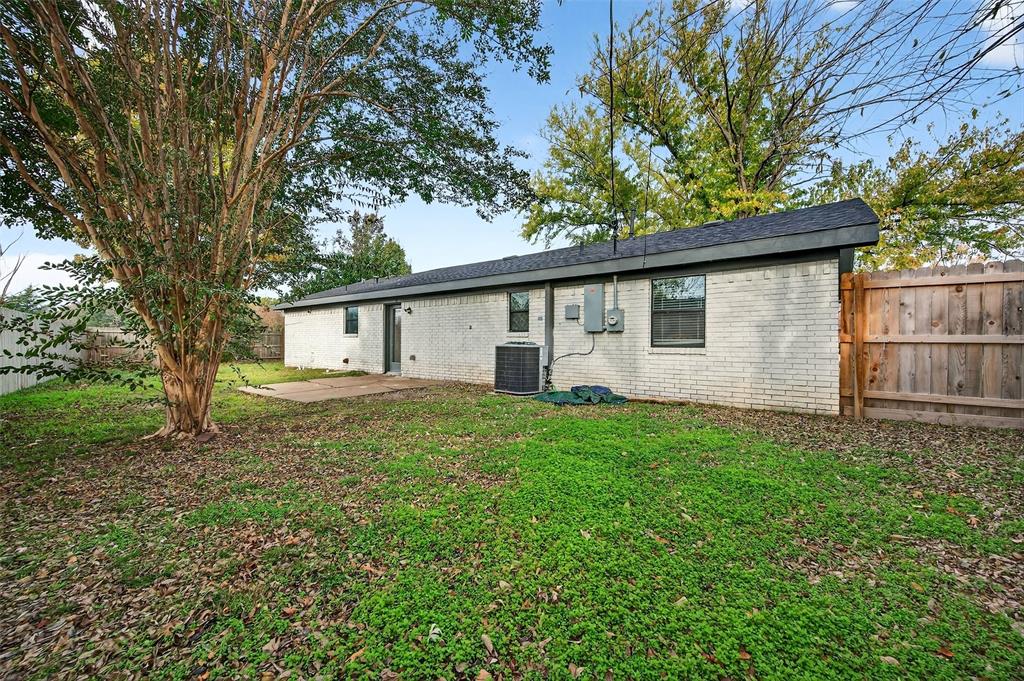 604 East Summit Street Sherman, TX 75090 - Photo 27 of 30 a view of a house with a backyard