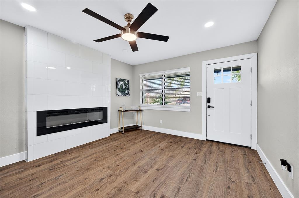 604 East Summit Street Sherman, TX 75090 - Photo 6 of 30 wooden floor in an empty room with a window