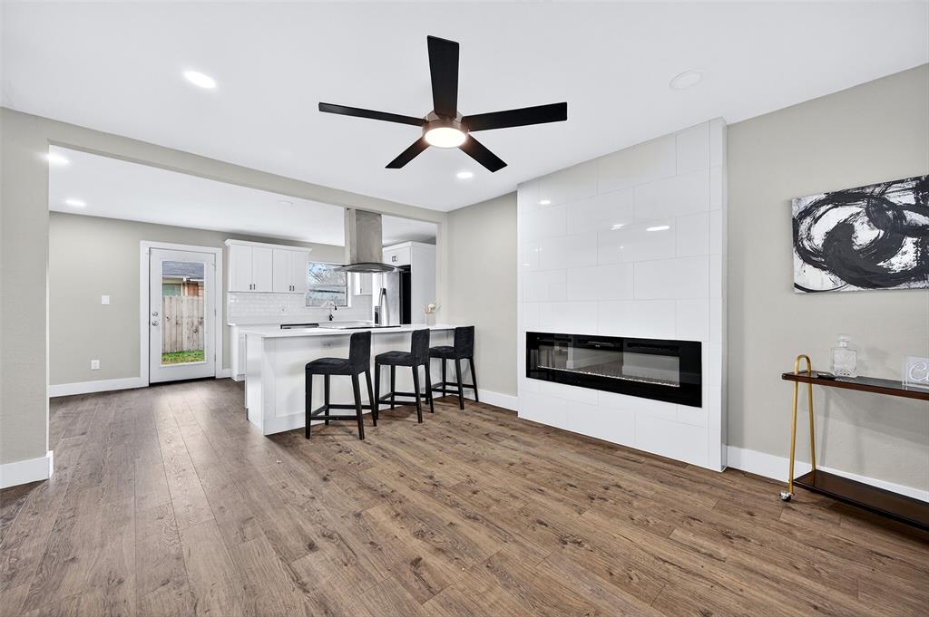 604 East Summit Street Sherman, TX 75090 - Photo 7 of 30 a view of a kitchen with a table and chairs