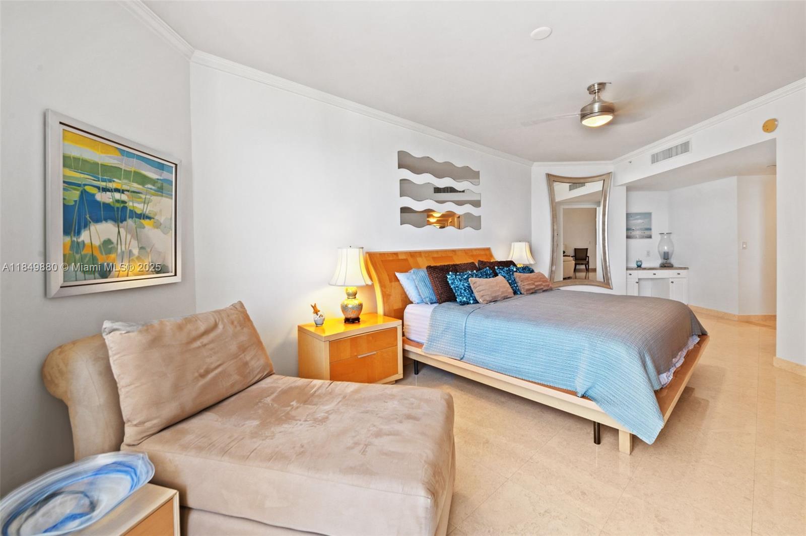 9595 Collins Avenue, Unit N7D Surfside, FL 33154 - Photo 20 of 32 a bedroom with a bed and couch