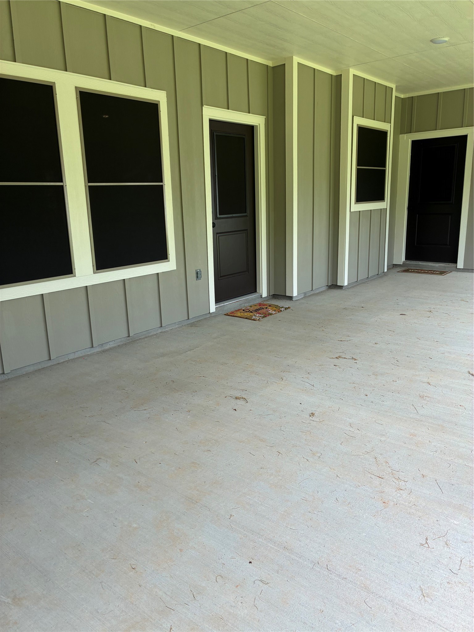 347 Iron Horse Road Willis, TX 77378 - Photo 24 of 49 Back covered patio with door into living area