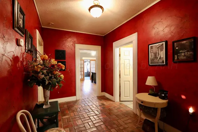 a view of an entryway with a workspace