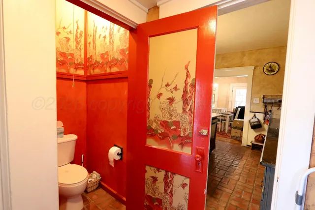 a view of a livingroom with furniture and a window