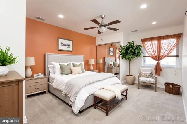 a bedroom with bed and window