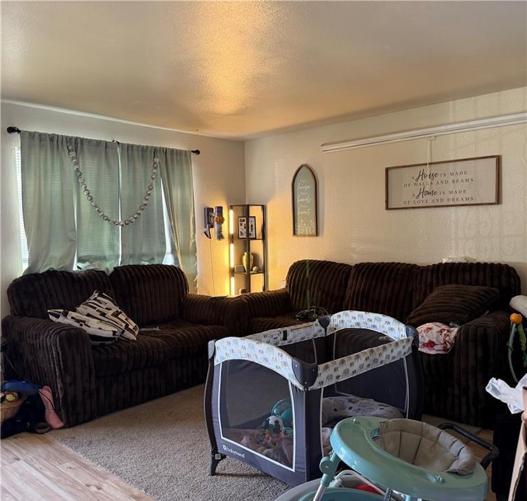 1567 Ellen Court Merced, CA 95341 - Photo 14 of 16 a living room with furniture and a couch