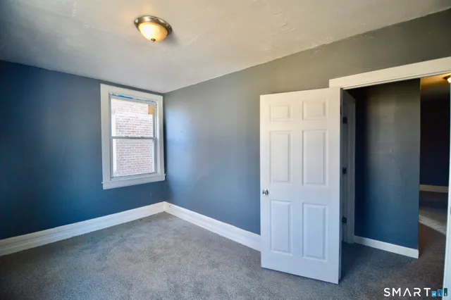 an empty room with closet